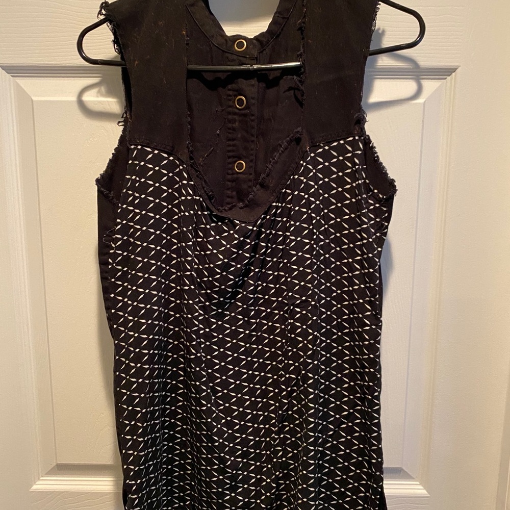 Buckle brand distressed vest.